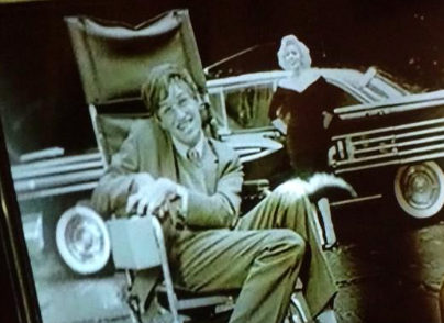 Eddie Redmayne as Stephen Hawking with Suzie Kennedy as Marilyn Monroe